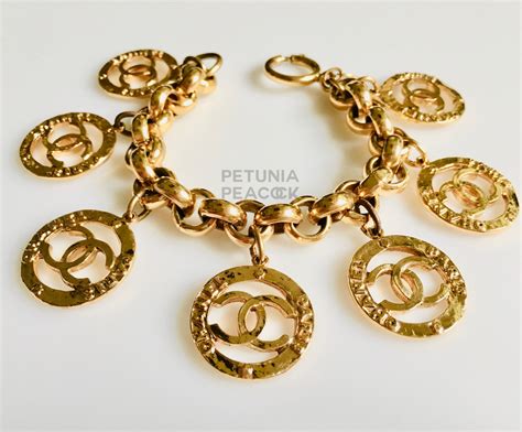 gold bracelet with chanel logo charms|vintage chanel bracelet gold.